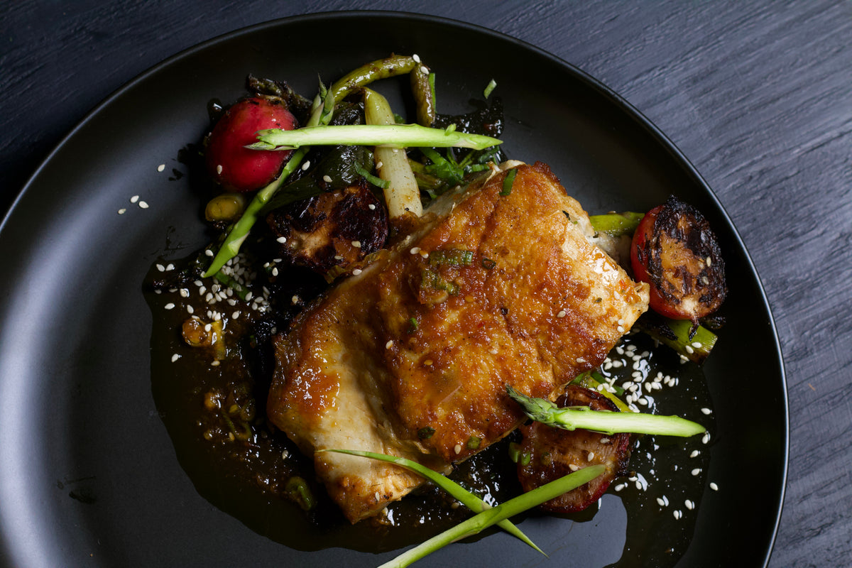 UMAMI MARINATED HALIBUT WITH CHARRED ASPARAGUS AND RADISHES it sauce